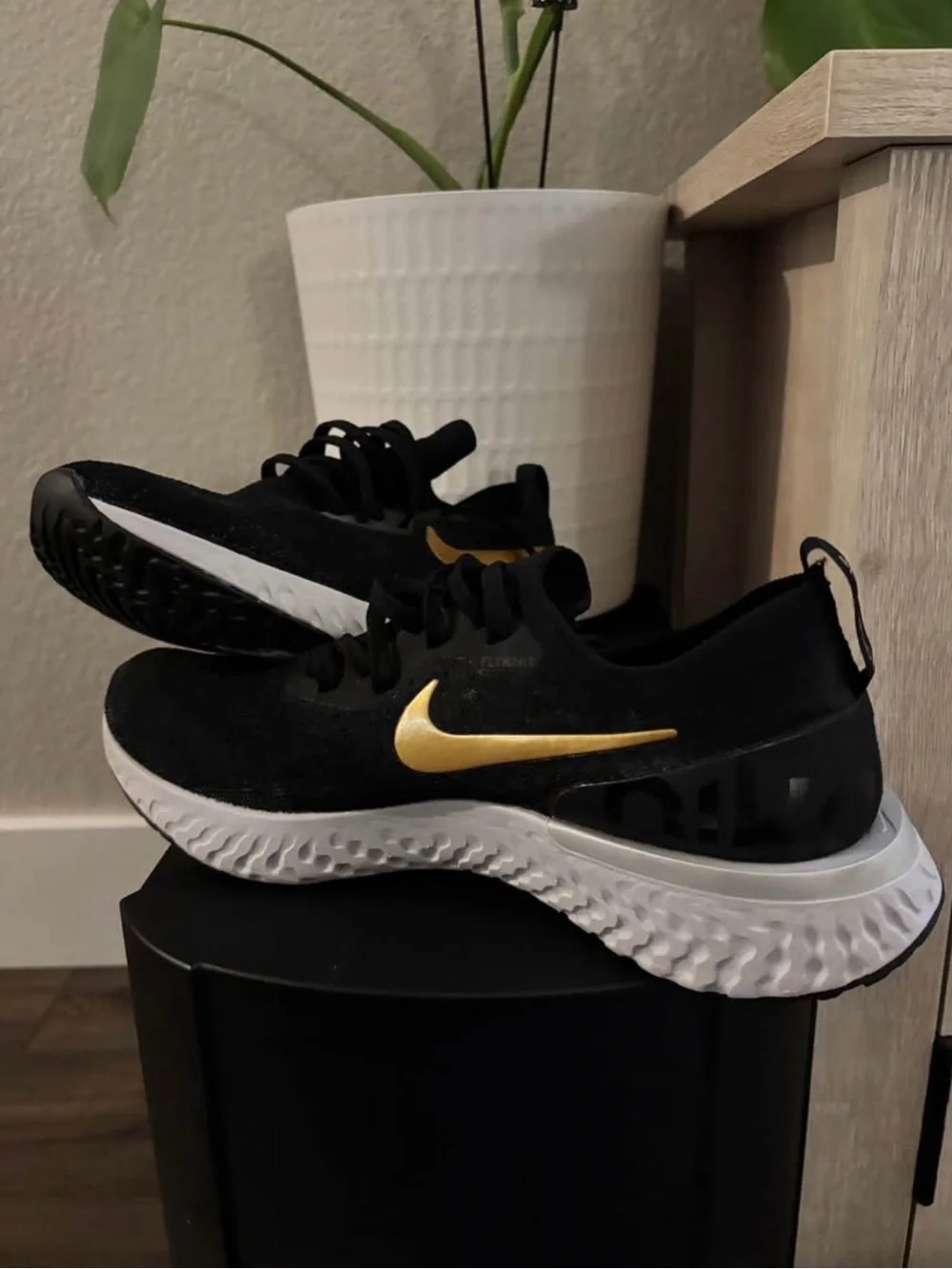 Nike Epic React Flyknit Sneakers Metallic Gold Swoosh